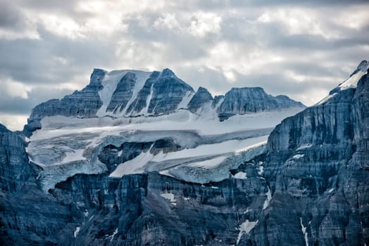 Glacier of Canada Rocky Mountains Panorama on cloudy sky