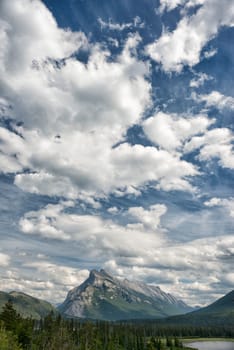 Canada Rocky Mountains Panorama on cloudy sky