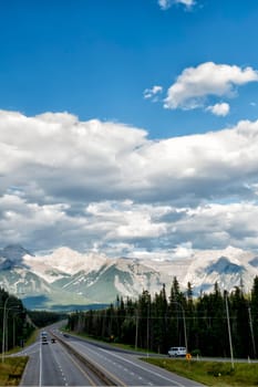 Canada Rocky Mountains Panorama on cloudy sky