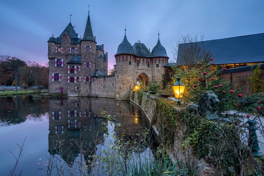 MECHERNICH, GERMANY - NOVEMBER 22, 2023: Panoramic image of old Satzvey castle during evening on November 22, 2023 in Eifel, North Rhine Westphalia, Germany