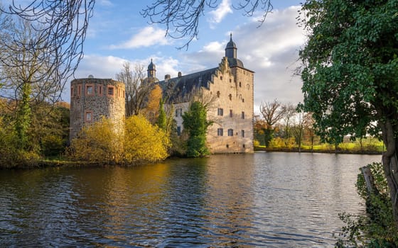 MECHERNICH, GERMANY - NOVEMBER 19, 2023: Panoramic image of old Veynau castle during evening on November 19, 2023 in Eifel, North Rhine Westphalia, Germany