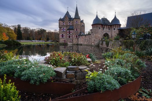 MECHERNICH, GERMANY - NOVEMBER 22, 2023: Panoramic image of old Satzvey castle during evening on November 22, 2023 in Eifel, North Rhine Westphalia, Germany