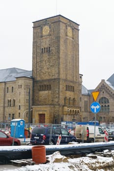 Poznan, Poland - February 3, 2023: Repair of communications, road and pavement in the city center. Traffic jam.