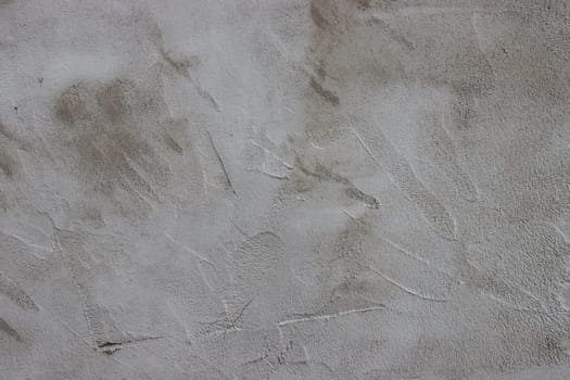 Gray concrete texture with grunge in daylight. Vintage and loft background.