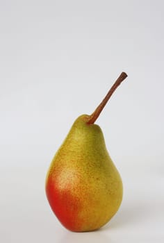 Ripe pear close-up on a white background. food advertisement.