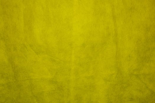 Fabric texture for design with copy space. Yellow abstract background with copy space.
