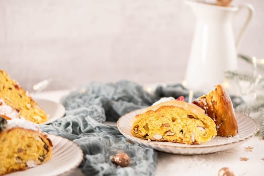 Bolo do Rei or King's Cake, Made for Christmas, Carnavale or Mardi Gras with Christmas season elements in Background.