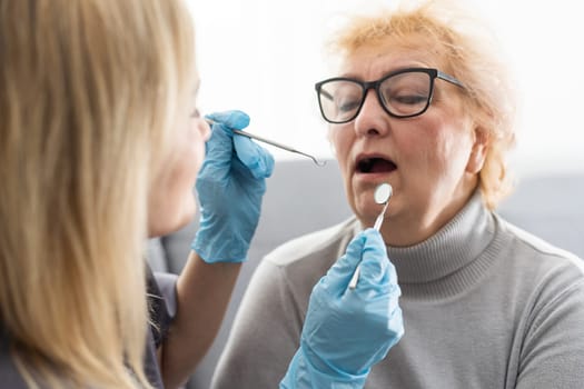 Female dentist and her patient