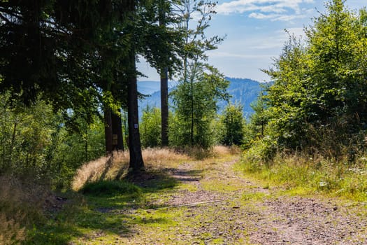 Beautiful green yellow and blue landscape in mountains seen from long and steep mountain trail