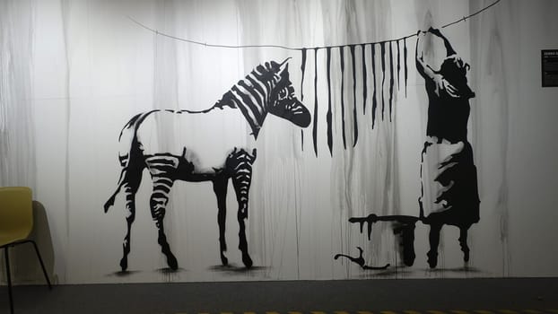 Stockholm, Sweden, December 29 2023. Art exhibition. The mystery of Banksi. A genius mind. Stripes.