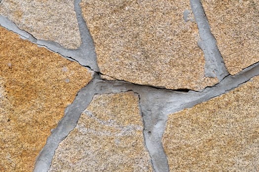 Stone with different stones. Texture, various natural stones