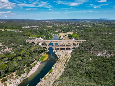 Aerial photo of Pont du Gard is ancient Roman aqueduct that crosses the Gardon River, High quality photo