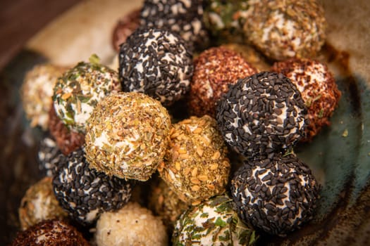 RECIPE FOR LABNEH CHEESE BOLLS WITH DRIED MINT, WHITE AND BLACK SESAME, SUMAC AND ZAATAR. High quality photo