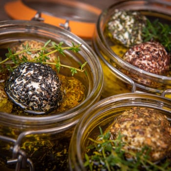 RECIPE FOR LABNEH CHEESE BOLLS WITH DRY MINT, BLACK AND WHITE SESAME, SUMAC AND ZAATAR IN A JAR WITH OLIVE OIL. High quality photo