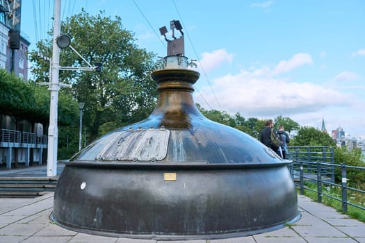 Hamburg, Germany, 1.08.2023, Old vintage brewery tank fountain near Hamburg harbor, historical famous tourist location of Hamburg