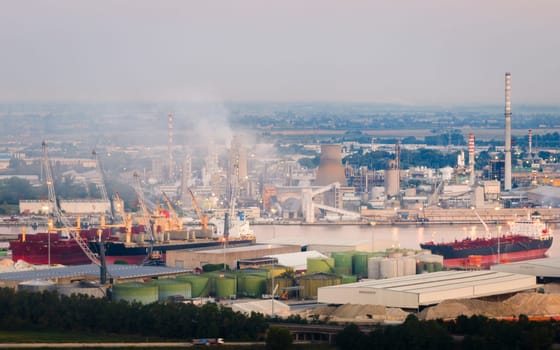 Drone shot of industrial and port area of Ravenna,production district is made up of a chemical and petrochemical pole, thermoelectric and metallurgical plants.