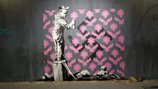 Stockholm, Sweden, December 29 2023. Art exhibition. The mystery of Banksy. A genius mind. Swastika.