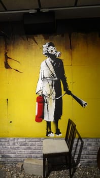 Stockholm, Sweden, December 29 2023. Art exhibition. The mystery of Banksy. A genius mind. Gas mask.