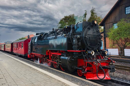 old black steam locomotive still in use in Germany from Wernigerode to the hill called brocken in hte harz