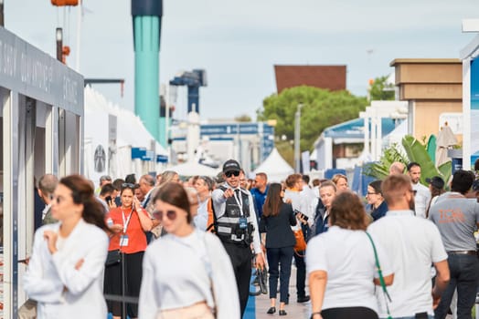 Monaco, Monte Carlo, 29 September 2022 - The famous motorboat exhibition, mega yacht show, clients and yacht brokers discuss the novelties of the boating industry, look at the mega yachts presented. High quality photo