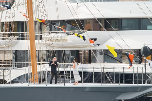 Monaco, Monte-Carlo, 29 September 2022 - the blogger makes a report from the event of the largest fair exhibition in the world yacht show MYS, port Hercules, a lot of new mega yachts, yacht brokers. High quality photo