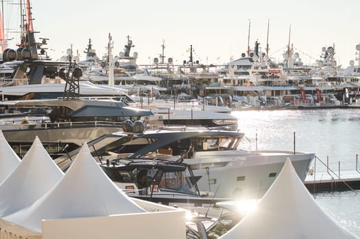 Monaco, Monte Carlo, 01 October 2022 - The famous motorboat exhibition at morning, mega yacht show, novelties of the boating industry. High quality photo