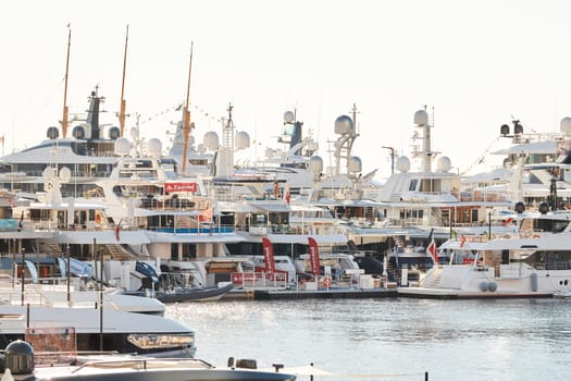 Monaco, Monte Carlo, 01 October 2022 - The famous motorboat exhibition at morning, mega yacht show, novelties of the boating industry. High quality photo