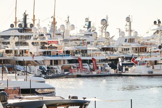 Monaco, Monte Carlo, 01 October 2022 - The famous motorboat exhibition at morning, mega yacht show, novelties of the boating industry. High quality photo