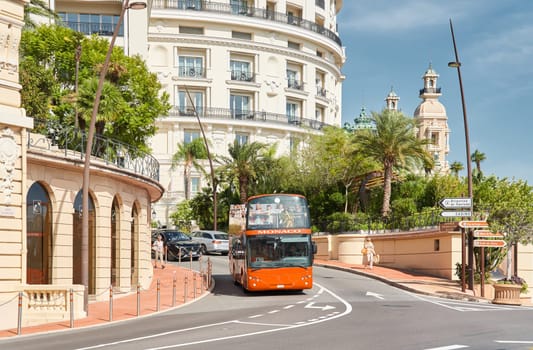 Monaco, Monte-Carlo, 29 September 2022 - Famous landmark Casino Monte-Carlo and hotel de Paris at sunny day, lifestyle of principality, wealth life, expensive luxury cars, sightseeing. High quality photo