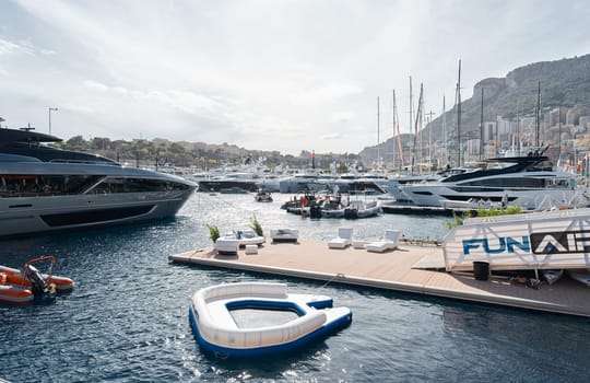 Monaco, Monte Carlo, 29 September 2022 - a lot of luxury yachts at the famous motorboat exhibition, the most expensive boats for the richest people, yacht brokers, boat traffic. High quality photo