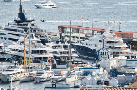 Monaco, Monte Carlo, 01 October 2022 - The famous motorboat exhibition at morning, mega yacht show, novelties of the boating industry. High quality photo