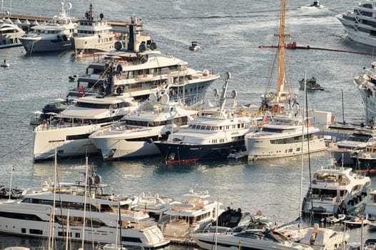 Monaco, Monte Carlo, 01 October 2022 - The famous motorboat exhibition at morning, mega yacht show, novelties of the boating industry. High quality photo