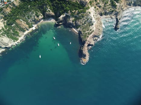 Aerial panoramic view of beautiful sunset above sea. Beautiful seascape. Sun glare, small waves on the water surface. Evening. Horizon. Nobody. No people. Copy space. Never-ending beauty of nature