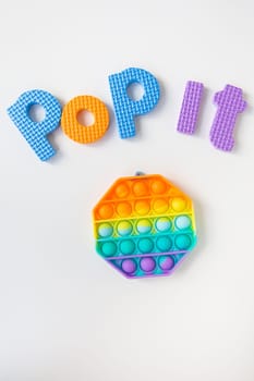 Pop it lettering. The most fashionable sensory toy. Popular fashionable silicone colorful anti-stress hexagonal toy