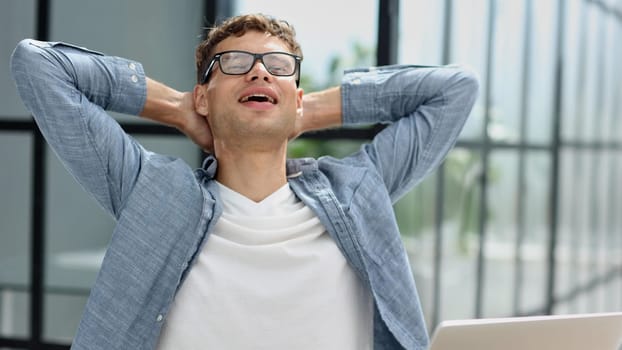 man resting in office relaxing, businessman meditating in lotus position