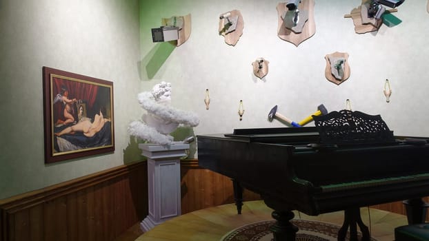Stockholm, Sweden, December 29 2023. Art exhibition. The mystery of Banksy. A genius mind. Grand piano.