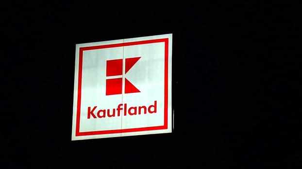 HUSTOPECE, CZECH REPUBLIC - DECEMBER 14, 2023: Kaufland logo on hypermarket from German chain, part of Schwartz Gruppe which also owns Lidl. It operates over 1,500 stores in Germany, Croatia, the Czech Republic, Slovakia, Poland, Romania, Bulgaria and Moldova.