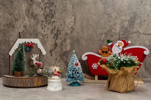 Image of some Christmas objects in composition isolated on a gray background.