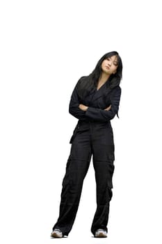 A woman in black clothes, on a white background, in full height, crossed her arms.