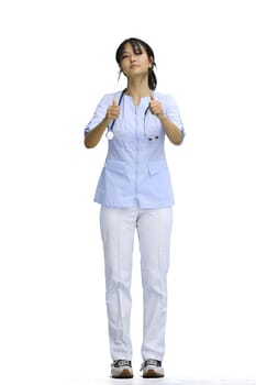 The doctor's girl, on a white background, in full height, shows her thumbs up.