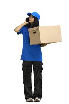 Delivery girl, on a white background, full-length, with a box and a phone.