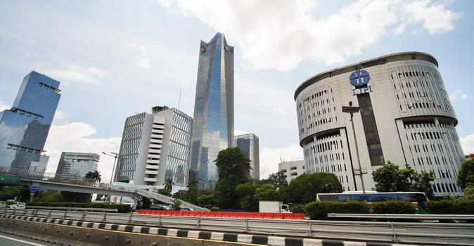 The streets and skyscrapers of the metropolis and capital of Indonesia.
