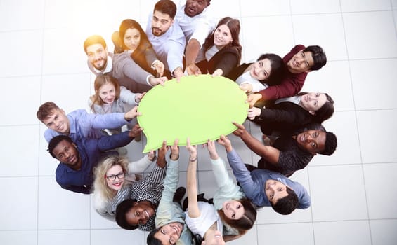 businessmen holding blank speech bubble above their heads. View from above