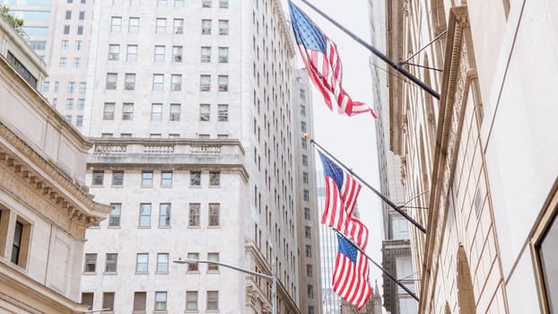 American flags on the main facade of the New York Stock Exchange - NYSE Building in the Financial District of Lower Manhattan in New York City is seen on July 4th, 2023.