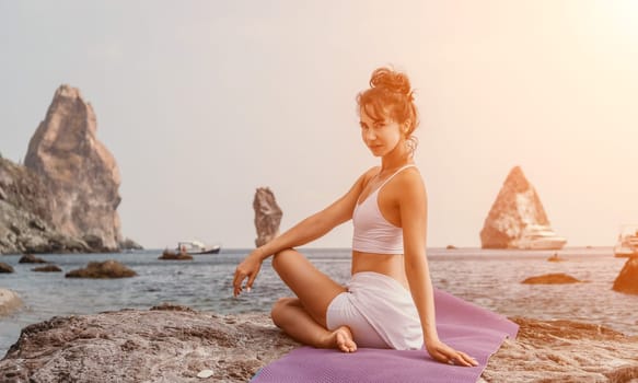 Fitness woman sea. Outdoor workout on yoga mat in park near to ocean beach. Female fitness pilates yoga routine concept. Healthy lifestyle. Happy fit woman exercising with rubber band in park.