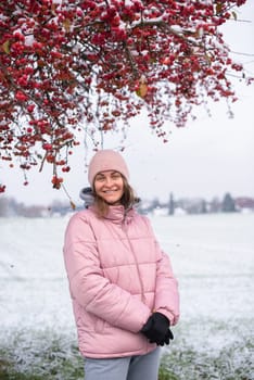 Winter Elegance: Portrait of a Beautiful Girl in a Snowy European Village