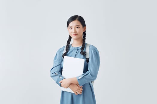 Smiling female student enhancing her future by attending regular lectures