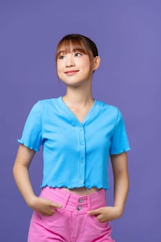 young beautiful smiling asian female in trendy summer clothes.