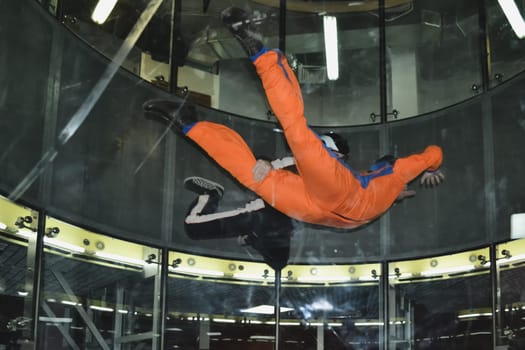 Men flight in the wind tunnel