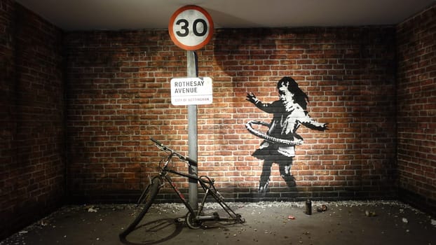 Stockholm, Sweden, December 29 2023. Art exhibition. The mystery of Banksy A genius mind. Little girl.
